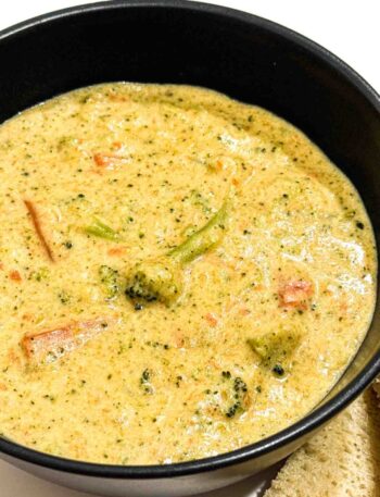 Copycat Broccoli Cheddar from Panera. Soup is in a black bowl