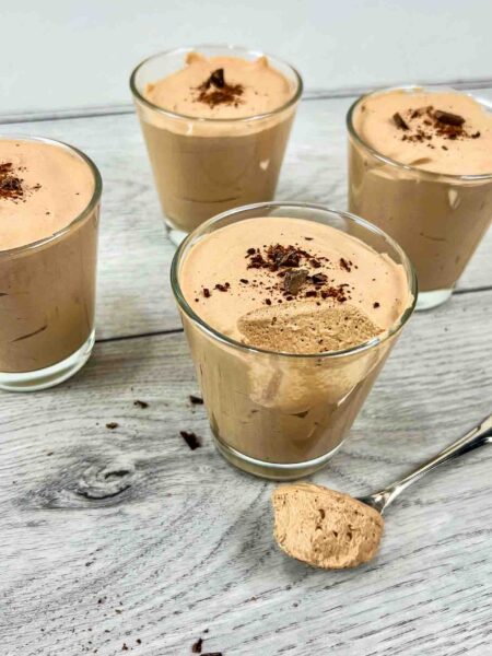 Baileys Irish Cream Chocolate Mousse in small glasses with chocolate pieces on top