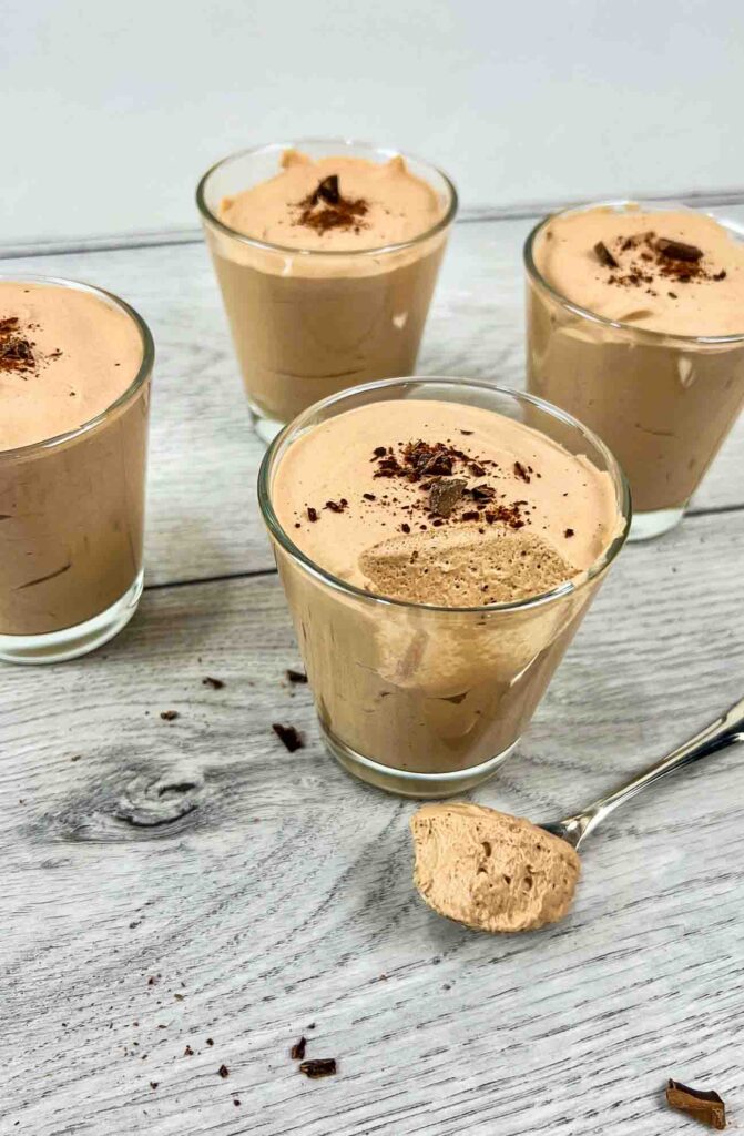 Baileys Irish Cream Chocolate Mousse in small glasses with chocolate pieces on top