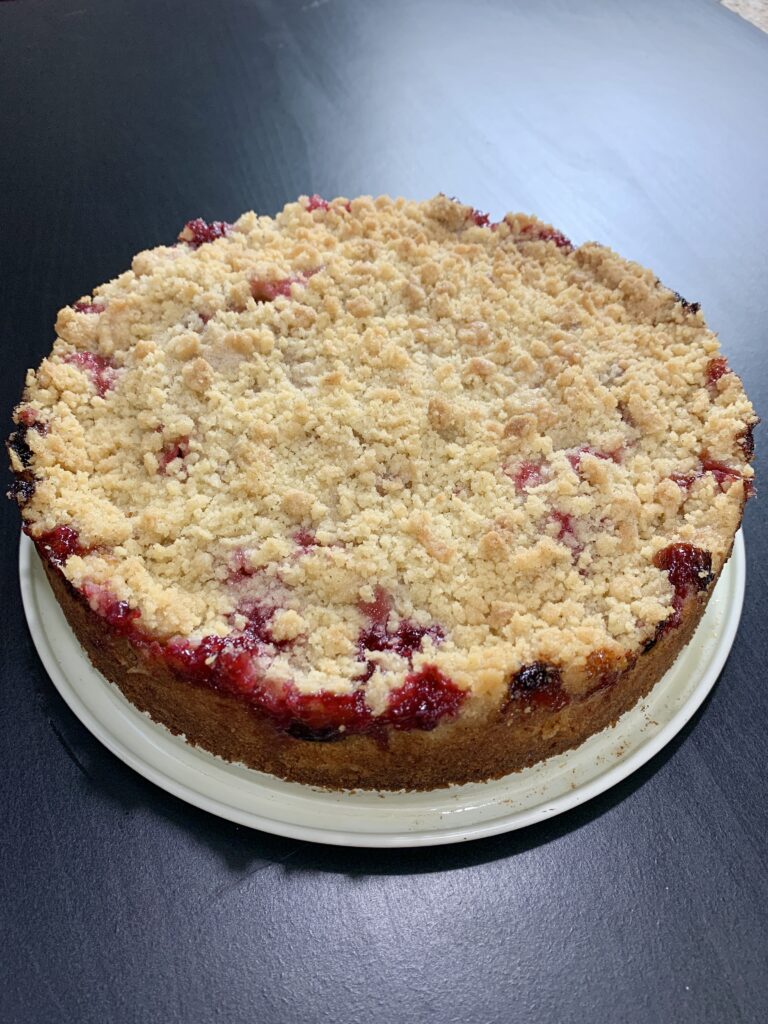 fresh baked whole plumcake with streusel