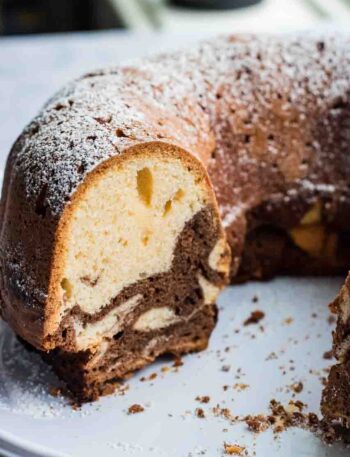 Marble cake ring or Mamorkuchen cut open on a white cake plate