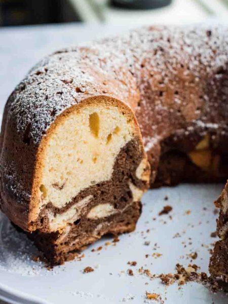 Marble cake ring or Mamorkuchen cut open on a white cake plate