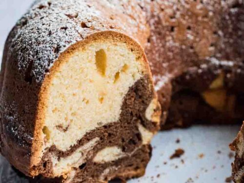 Marble cake ring or Mamorkuchen cut open on a white cake plate