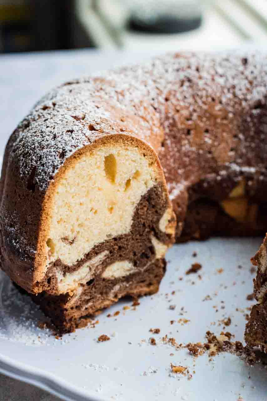 Marble cake ring or Mamorkuchen cut open on a white cake plate