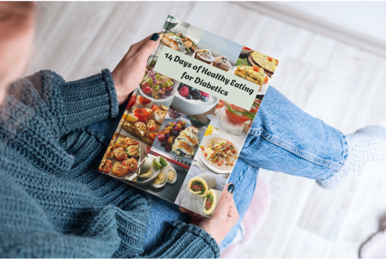 woman hold 14 day diabetic friendly meal plan book in her hands while sitting