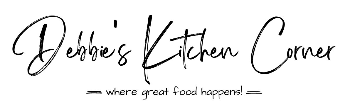 This is Debbie's Kitchen Corner Logo in writing
