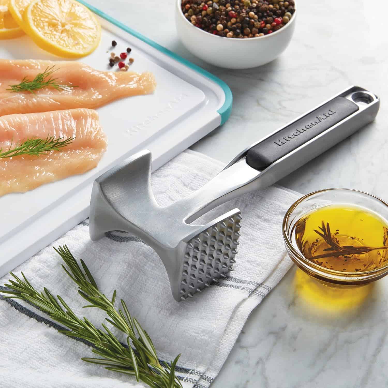 Multi sided meat hammer and tenderizer.