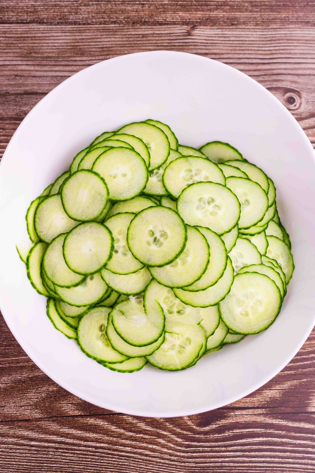 plain cucumber slices in a white bowl