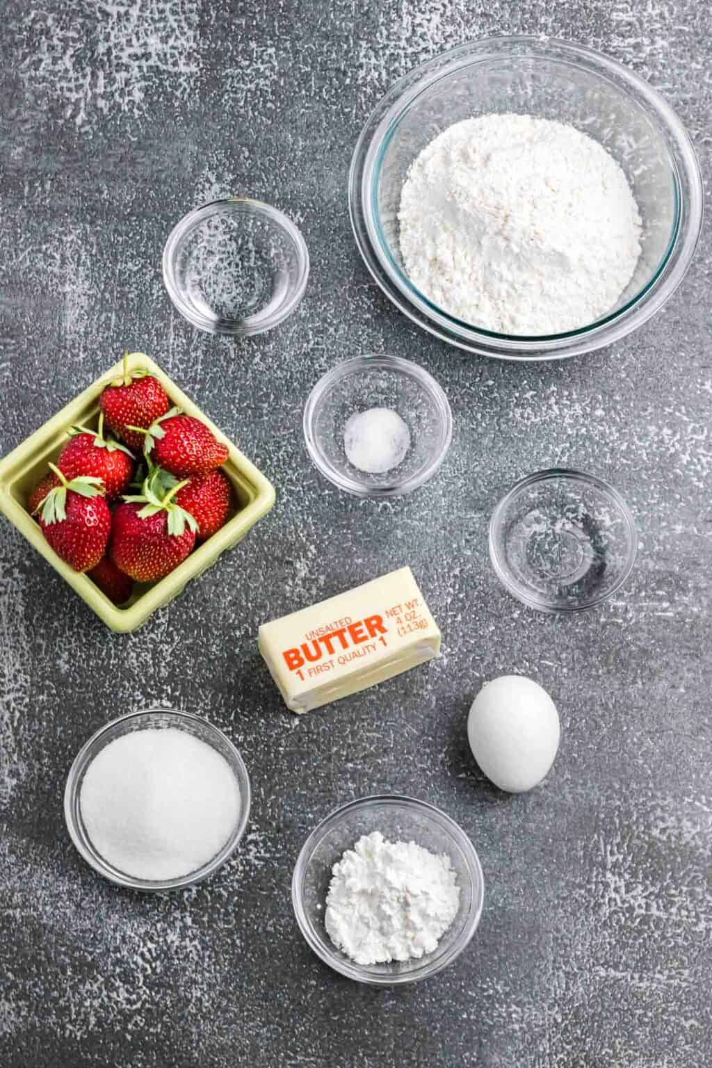All the ingredients for the strawberry galette spread out on the counter.