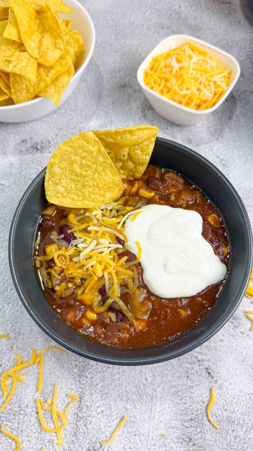 Crockpot Chili in a bowl with tortilla chips