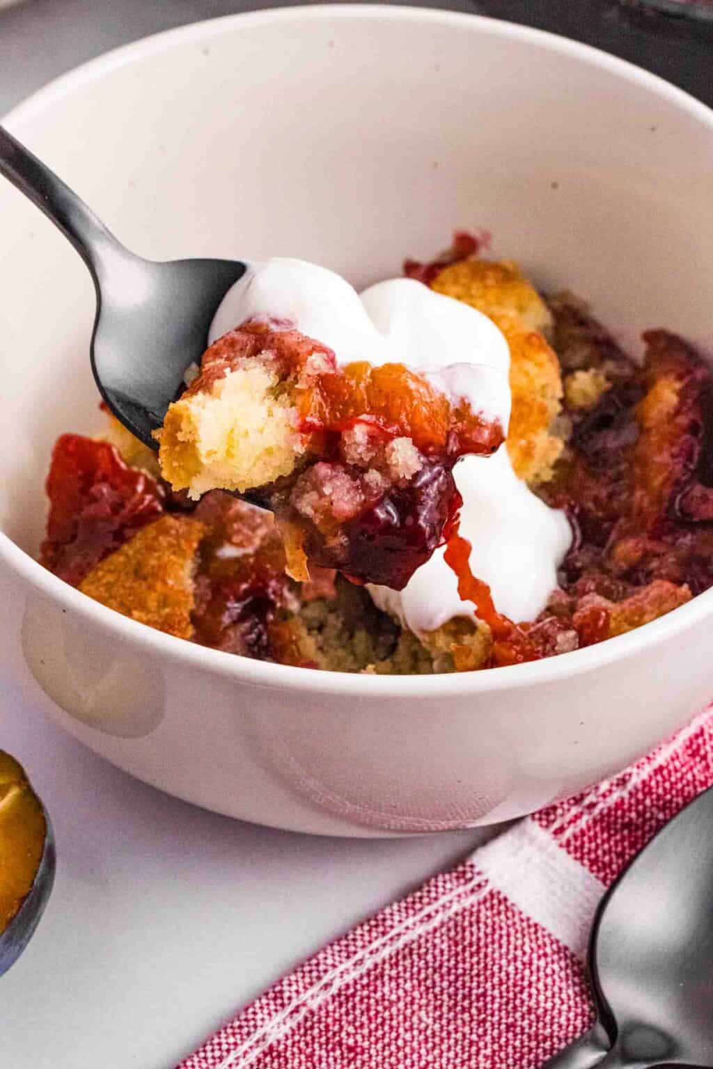 A bowl of hot yummy Plum Cobbler