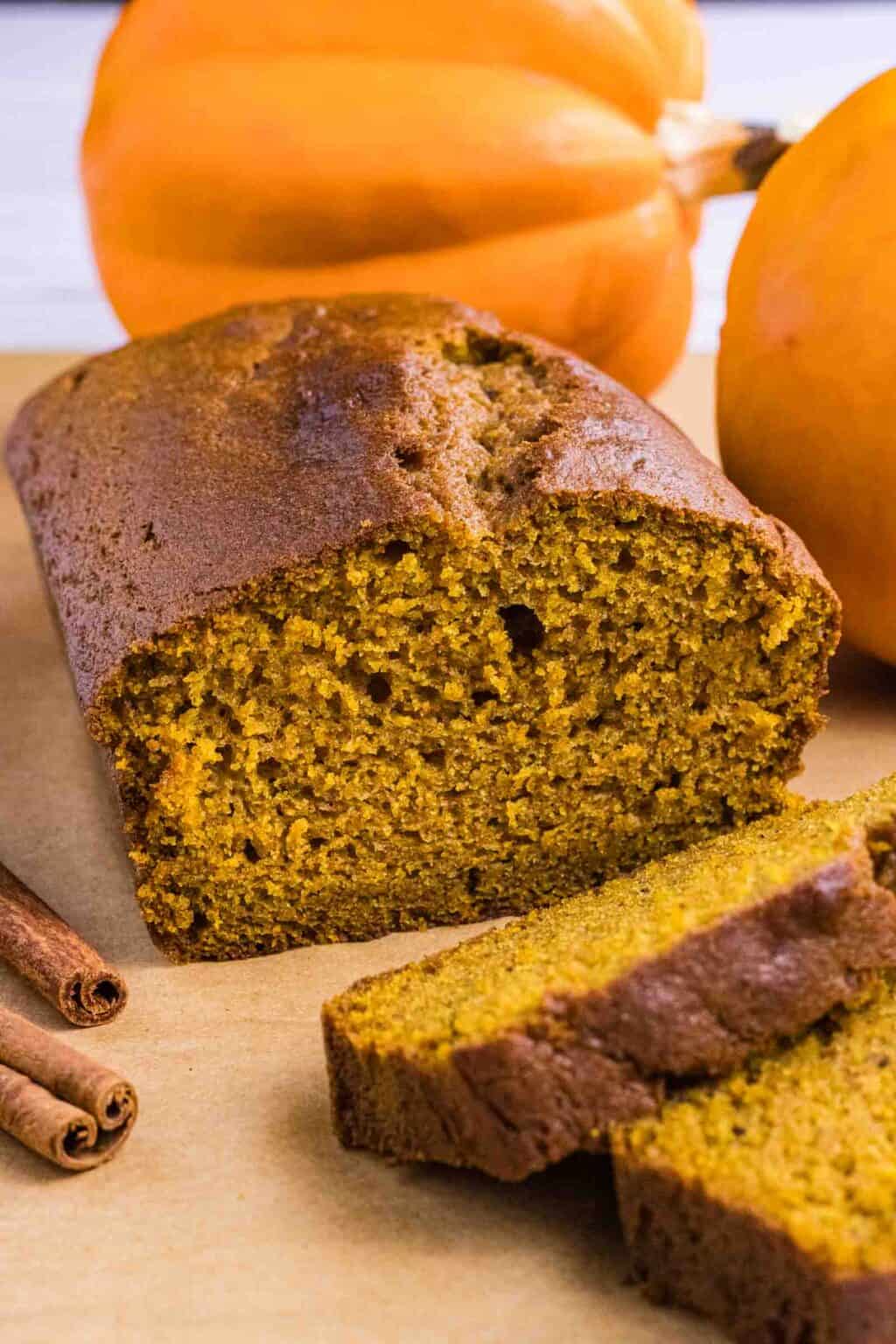 Pumpkin Bread cut open in slices on countertop