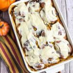 Cream Cheese Frosted Pumpkin Cinnamon Rolls in baking dish.