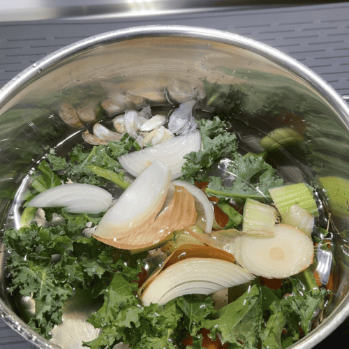 Ingredients in a pot for homemade Chicken Broth