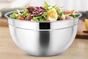 Stainless Steel bowl with Pasta Salad in it for mixing it thoroughly