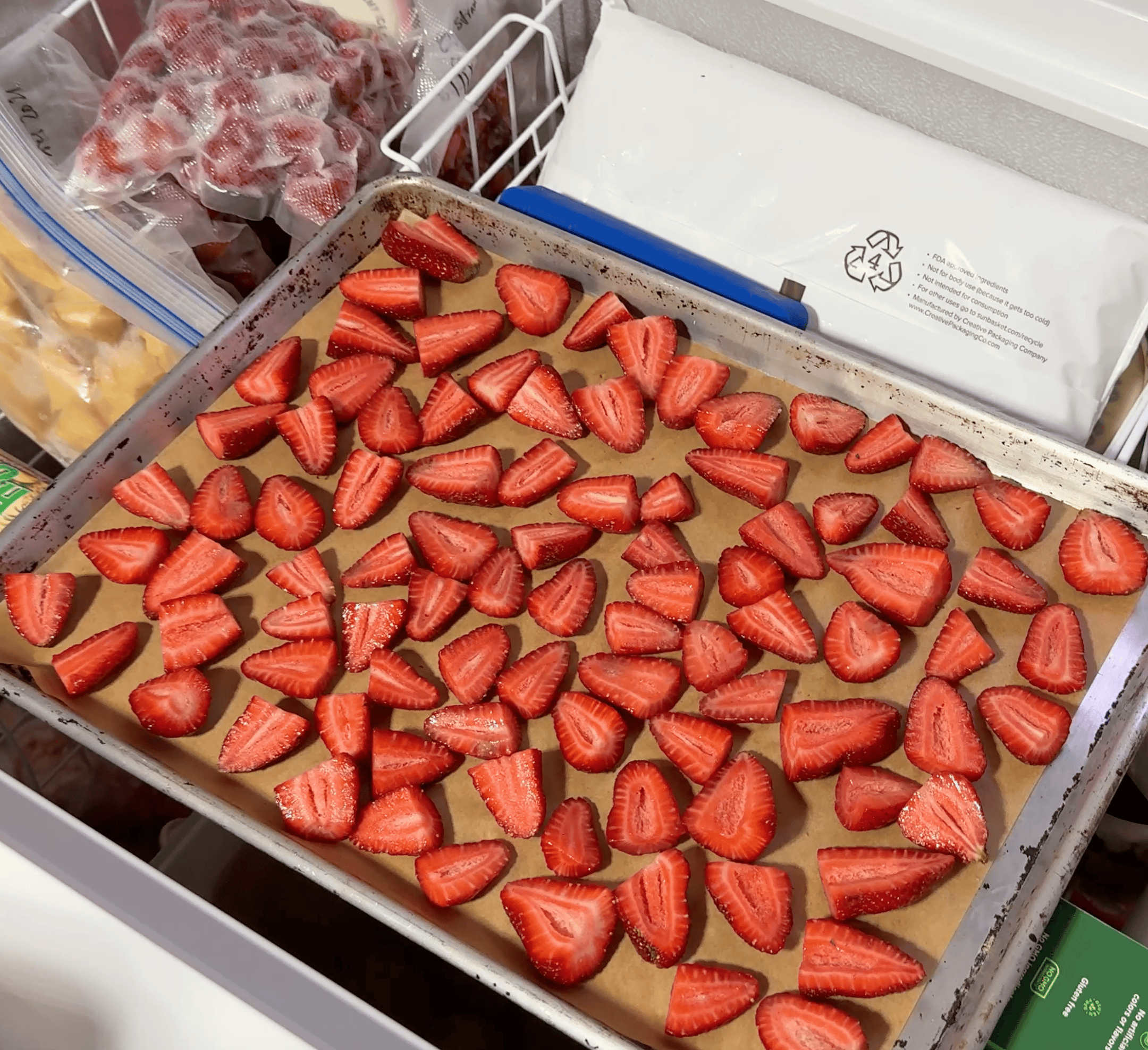 frozen straw on a baking sheet in the freezer
