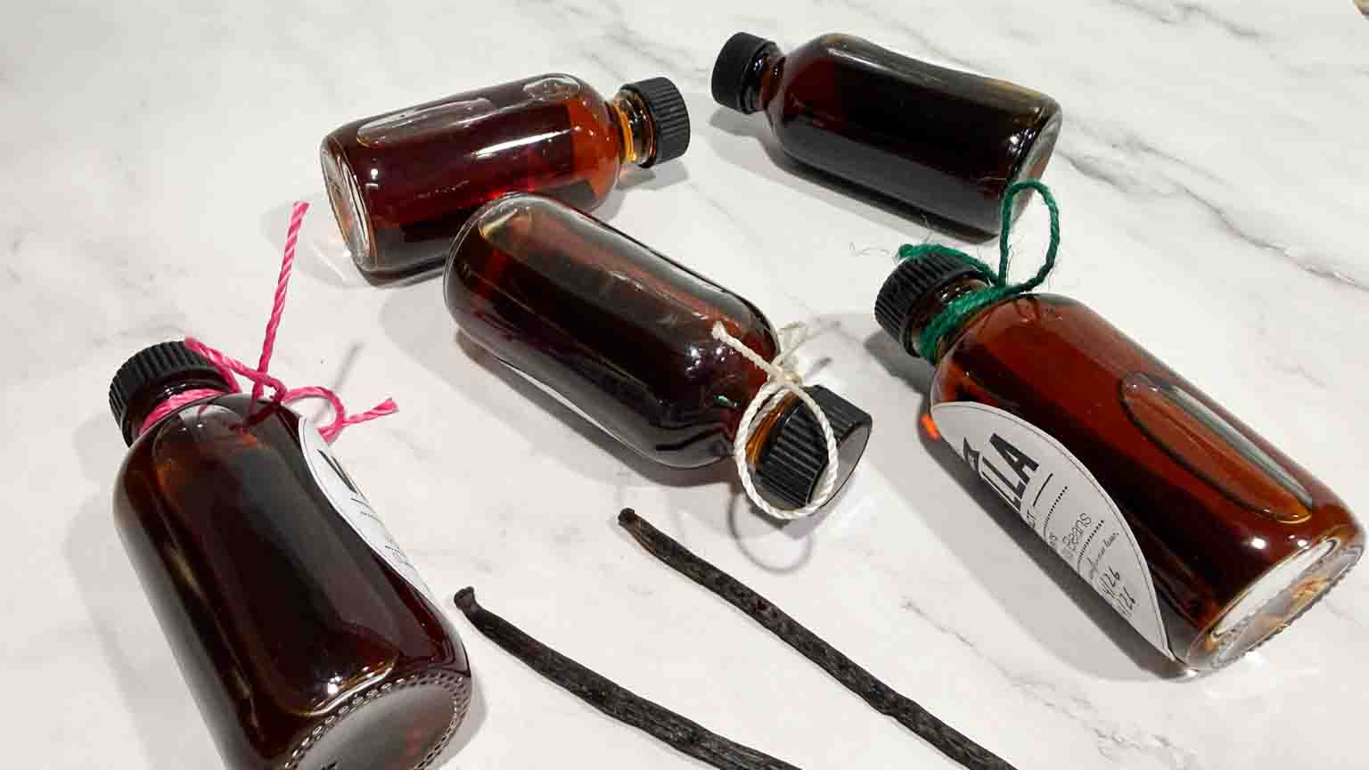 homemade vanilla bottles laying on the counter