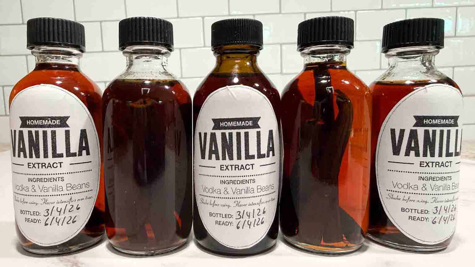 vanilla extract bottles lined up in a row