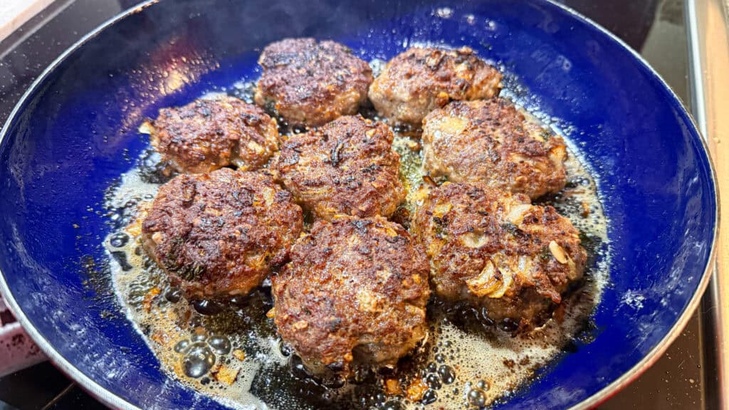finished fried frikadellen in pan