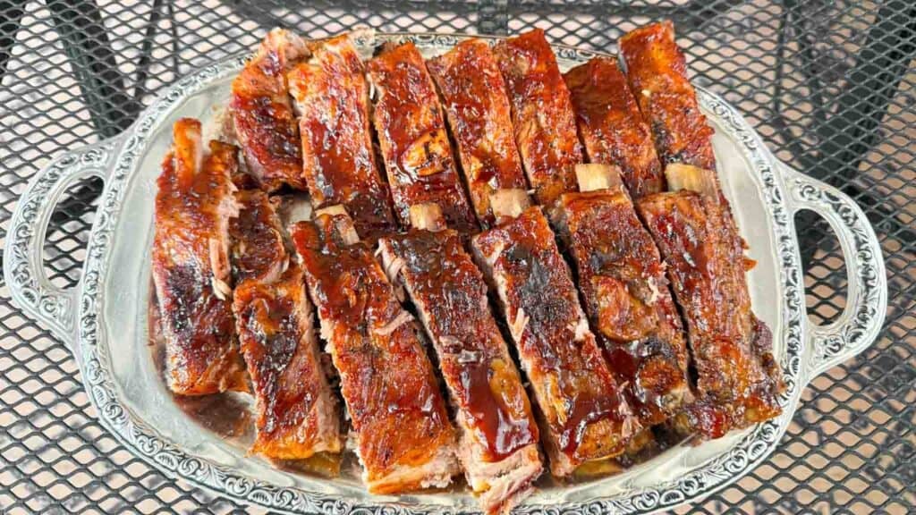 1 Rack of Pork Loin Back Ribs smothered with BBQ Sauce and baked in oven