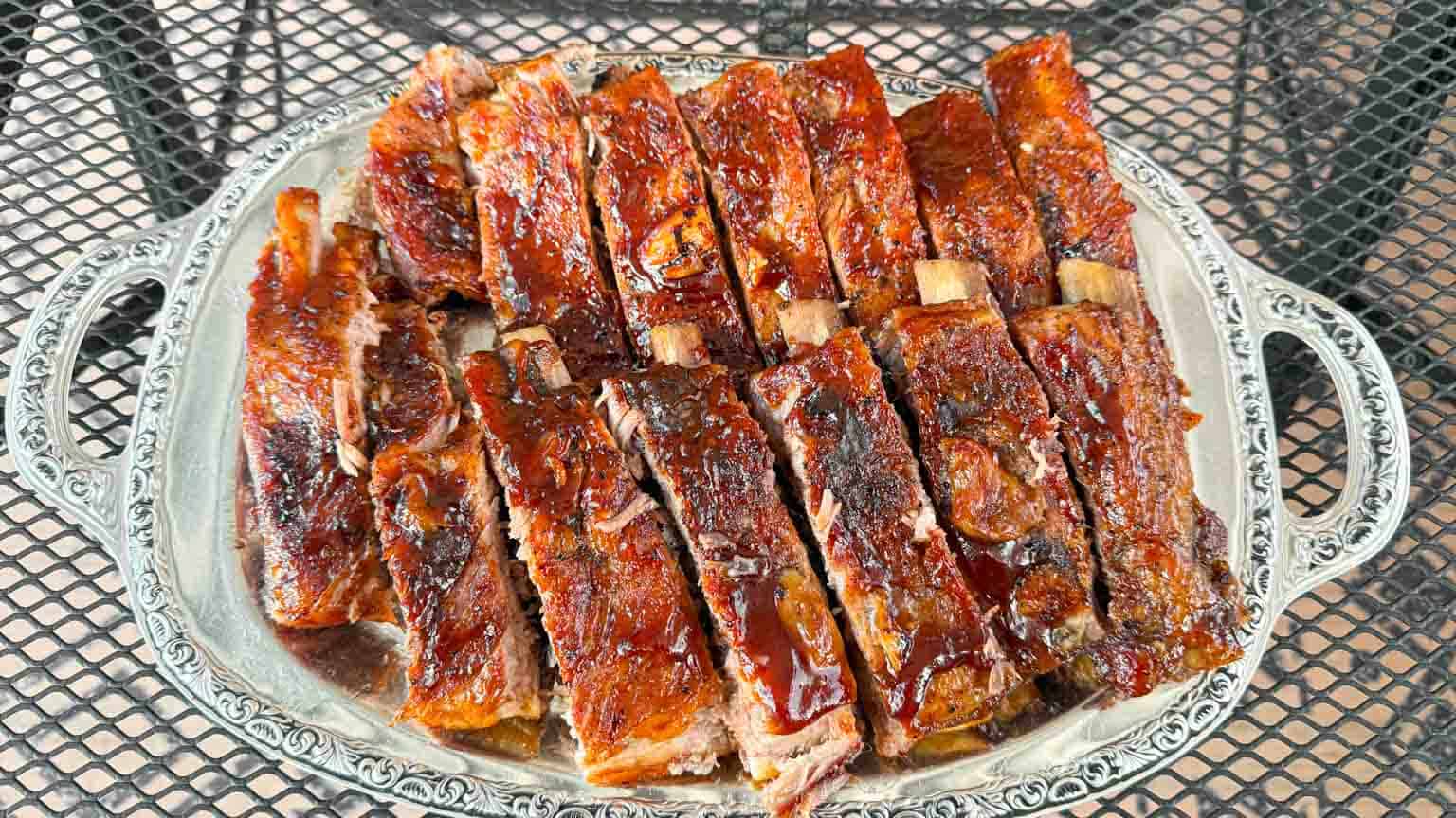 1 Rack of Pork Loin Back Ribs smothered with BBQ Sauce and baked in oven