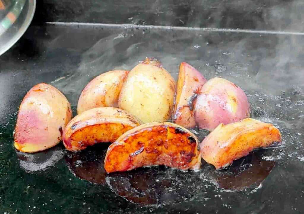 grilled peach slices grilled in sugar, butter cinnamon mix