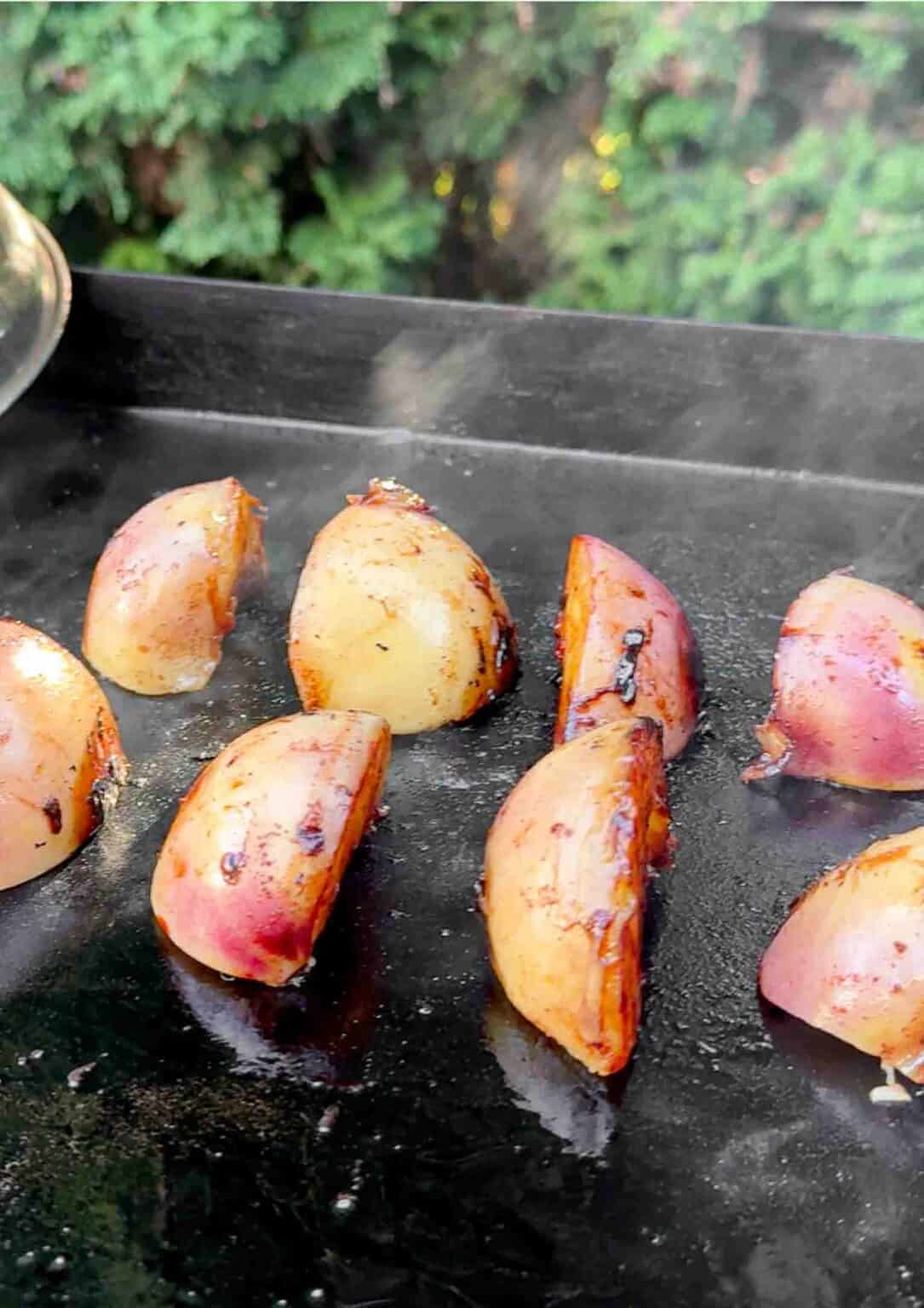 grilled sliced peaches brushed with a butter sugar cinnamon mix