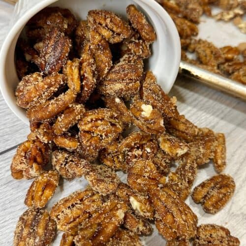 Bourbon Candied Pecans poured out on the counter and ready to eat