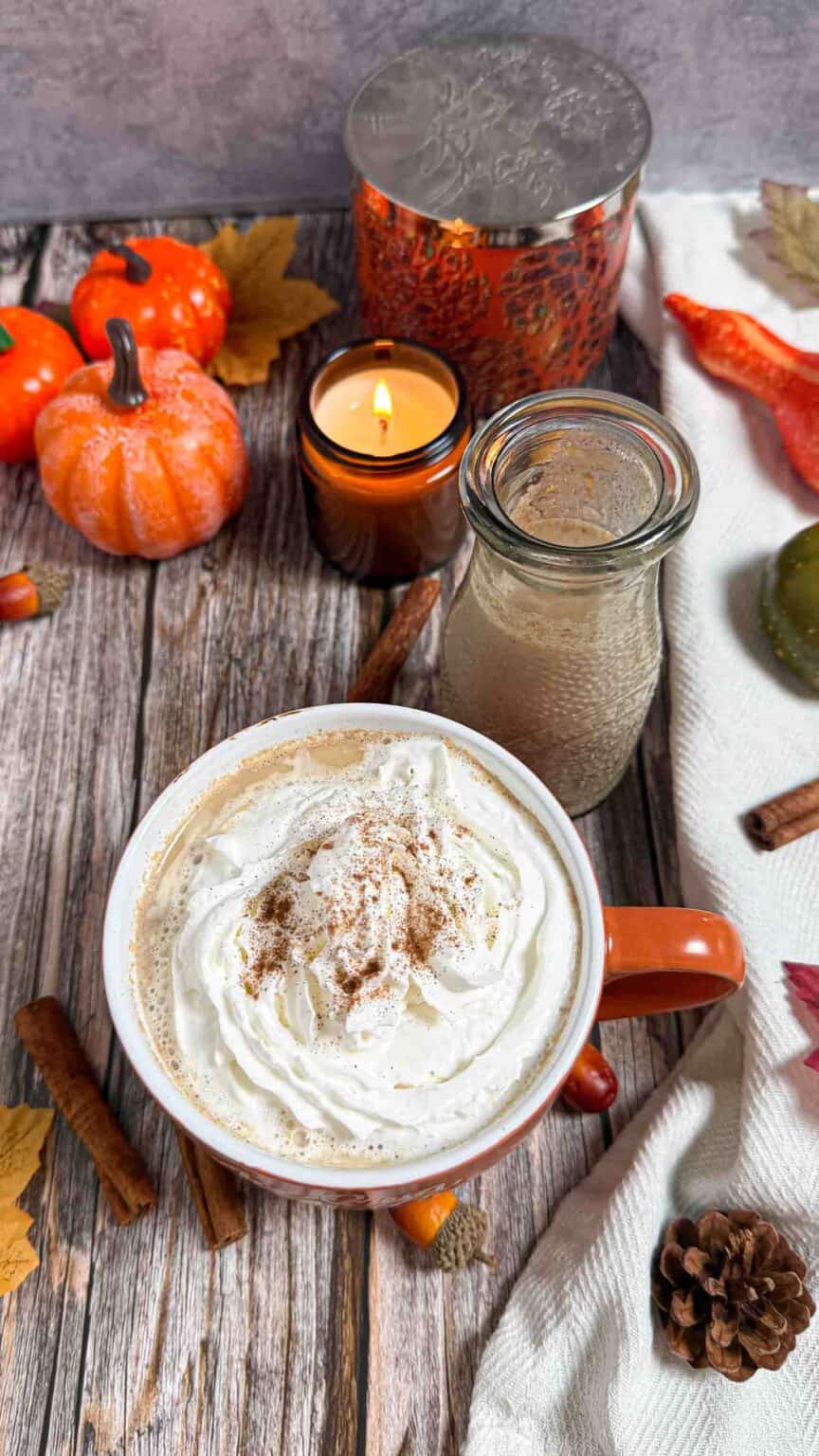 coffee with pumpkin spice creamer and topped with whipping cream